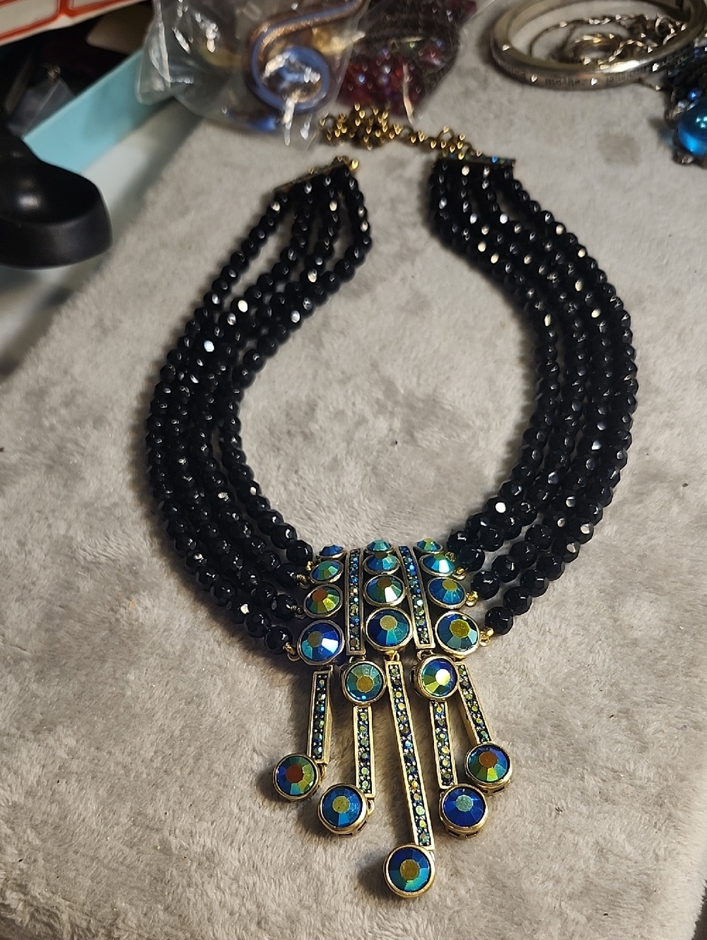 Heidi Daus Black Multi-Strand Beaded Necklace with Blue-Green Iridescent Pendant